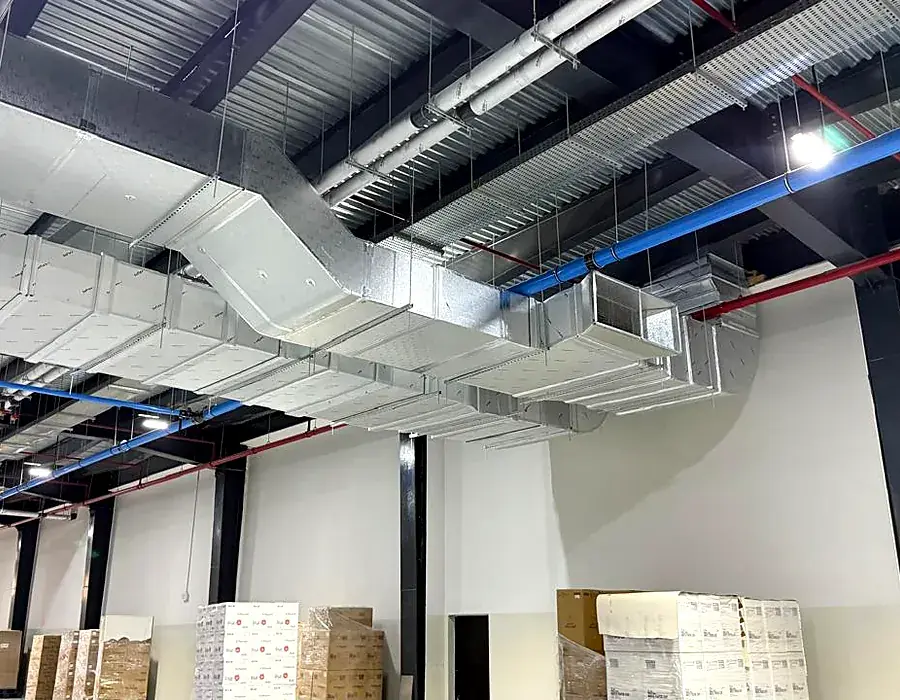 Ductwork installation in an industrial production facility