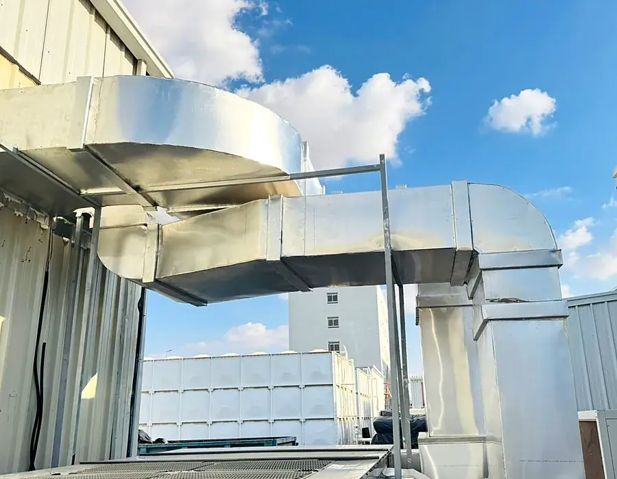 Packaged AC units and rooftop ducting for a factory kitchen area