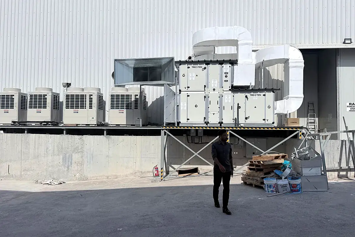 VRF outdoor units and fresh air handling unit installed on a rooftop by IEC UAE